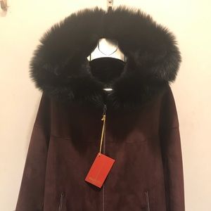 Size l-xl , new ,colour burgundy,natural fur
